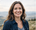 Photographic portrait of a smiling brunette woman in a dark outdoor jacket against a softly blurred mountain-lake background.
