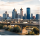 News thumbnail showing a dense city skyline in warm light.